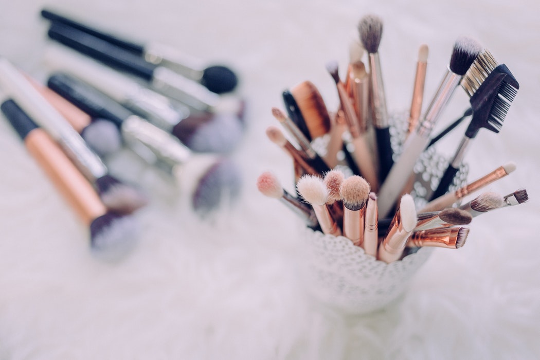 Makeup brushes standing in a holder