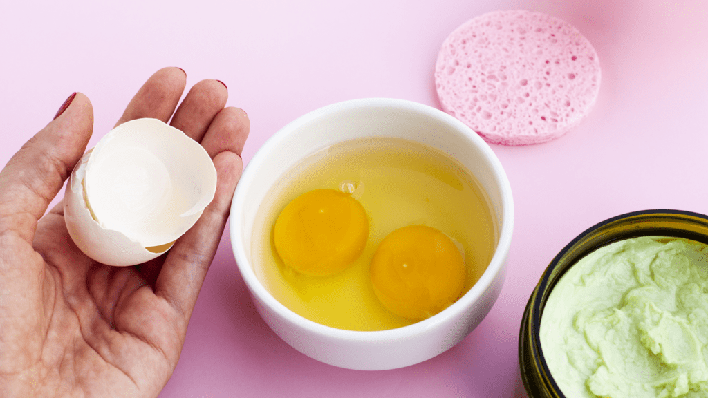 Pamper Yourself: The Best Homemade Face Masks rsz high angle body butter hand holding eggshell pink background 1024x576 - Pamper Yourself: The Best Homemade Face Masks
