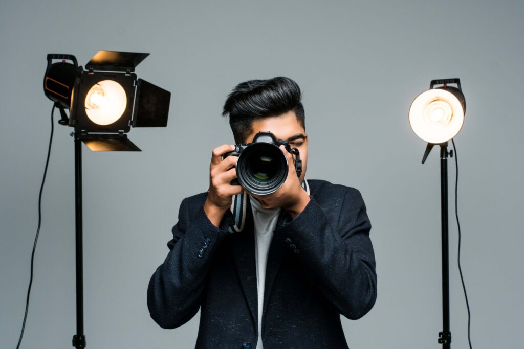 7 high-paying jobs in the beauty industry and how to find them professional indian young photographer taking photos studio with leight min 1024x683 - 7 high-paying jobs in the beauty industry and how to find them