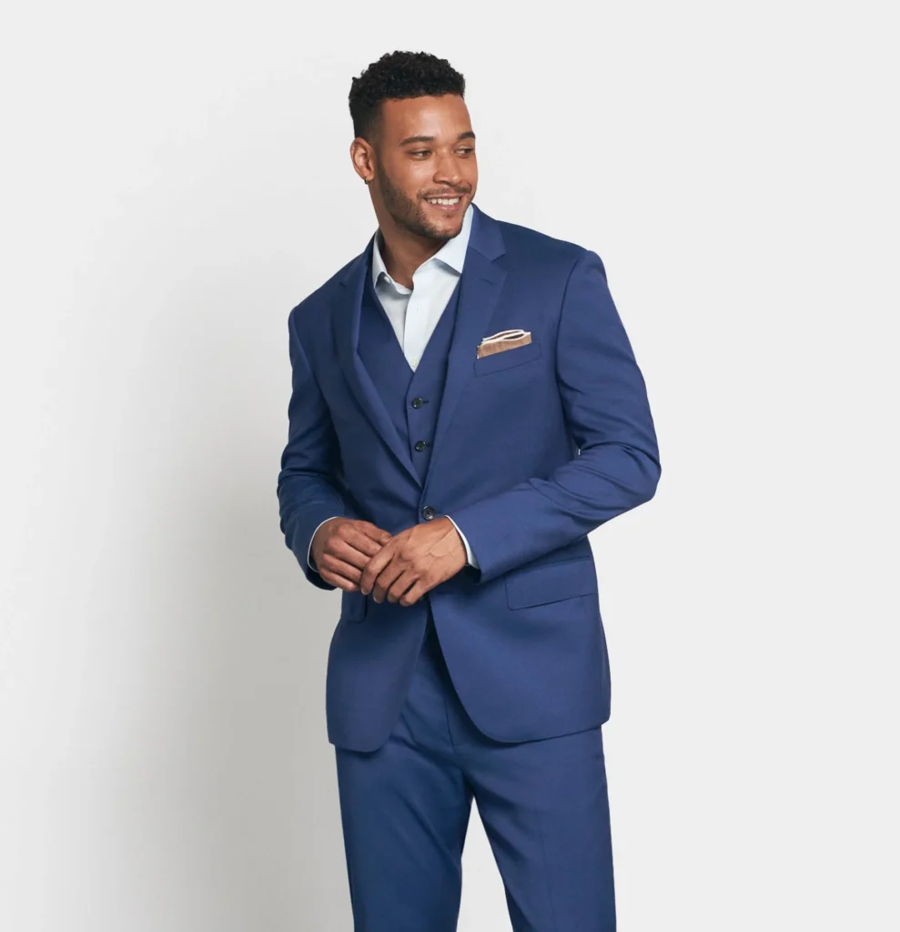 A striking royal blue suit designed for the groom who wants to make a bold yet refined fashion statement on the big day.