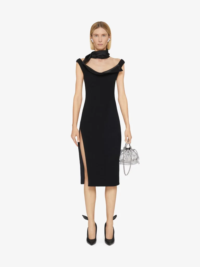 Stylish wool dress with a swallow collar, offering a fresh twist on the classic Little Black Dress, highlighting its evolution into unique and sophisticated styles.