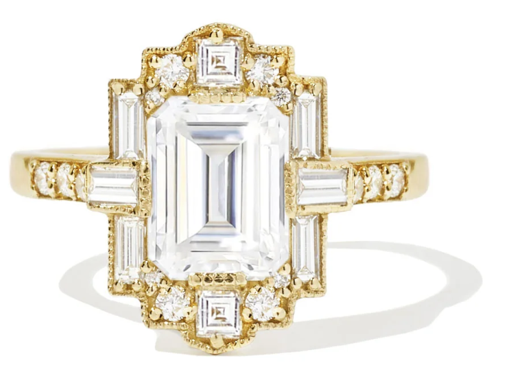Art Deco elegance meets modern brilliance in this emerald-cut beauty.