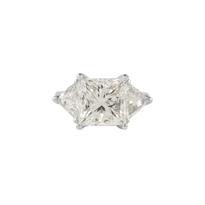 Platinum, 6.05ct Princess Cut Diamond and Diamond Three Stone Ring