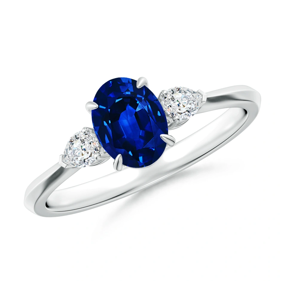 Oval Blue Sapphire and Pear Diamond Three Stone Engagement Ring
