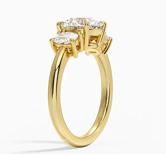 Faye Elongated Cushion Three Stone Diamond Engagement Ring in 18K Yellow Gold