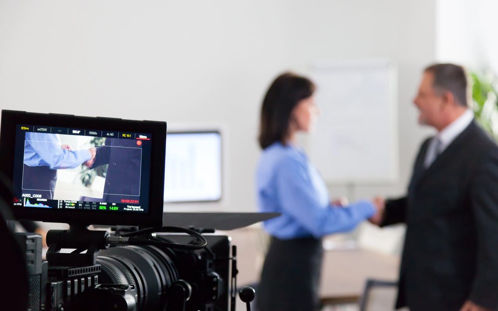 Camera and monitor on a television studio floor